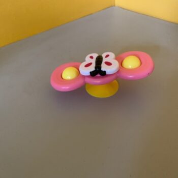 hochet papillon touniquet ventouse