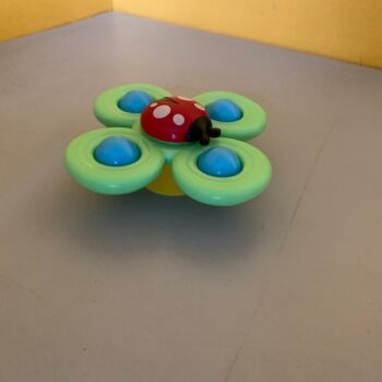 hochet coccinelle tourniquet ventouse